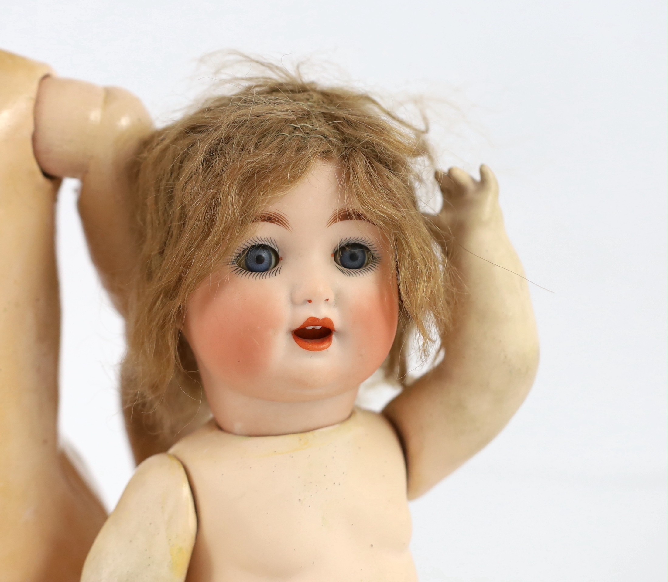 A bisque doll, German, circa 1900, 12in.